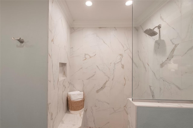 bathroom featuring ornamental molding and a shower