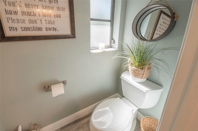 bathroom with tile patterned floors