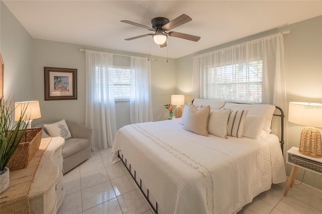 tiled bedroom with ceiling fan