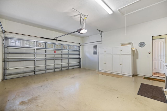 garage featuring a garage door opener and electric panel