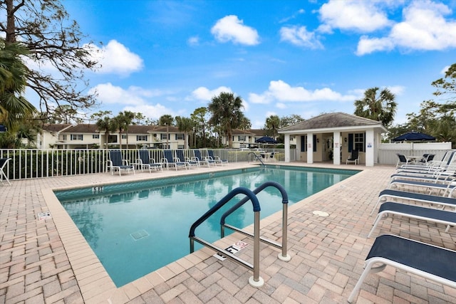 view of swimming pool with a patio