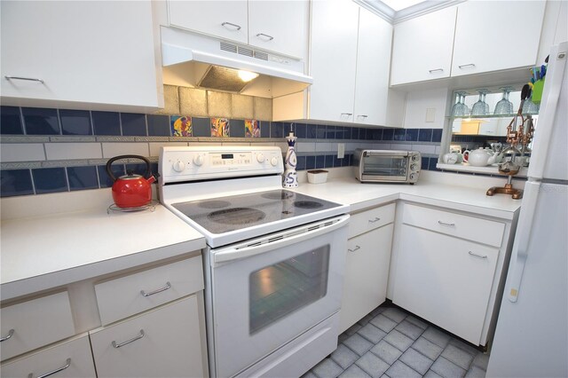 kitchen featuring white cabinetry, white appliances, and decorative backsplash