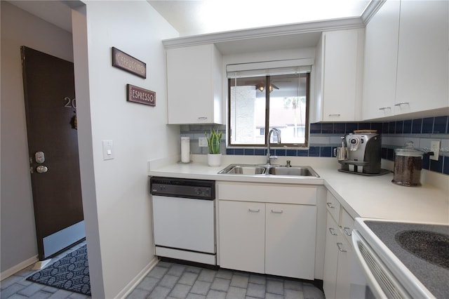 kitchen featuring white cabinetry, sink, white appliances, and decorative backsplash