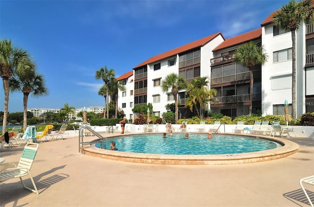 view of pool featuring a patio area