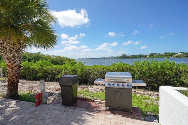 view of patio featuring a water view