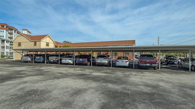 view of parking with a carport