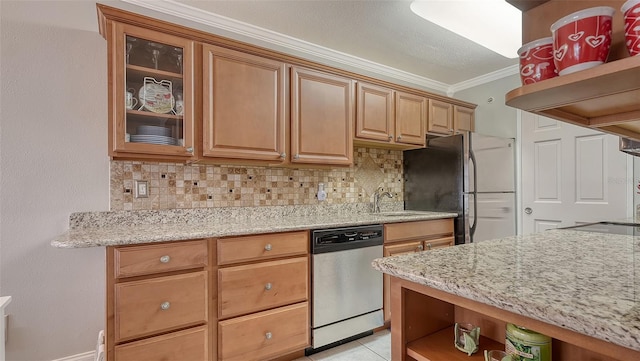 kitchen with crown molding, appliances with stainless steel finishes, sink, and decorative backsplash