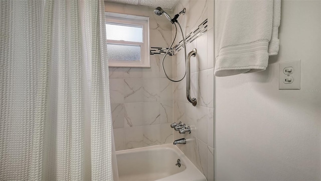 bathroom with shower / tub combo