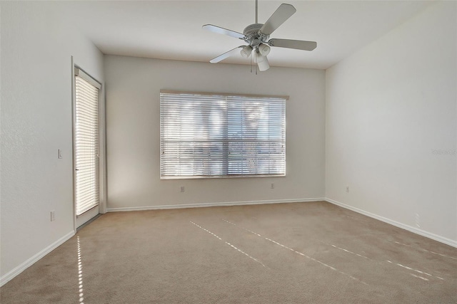 spare room with ceiling fan