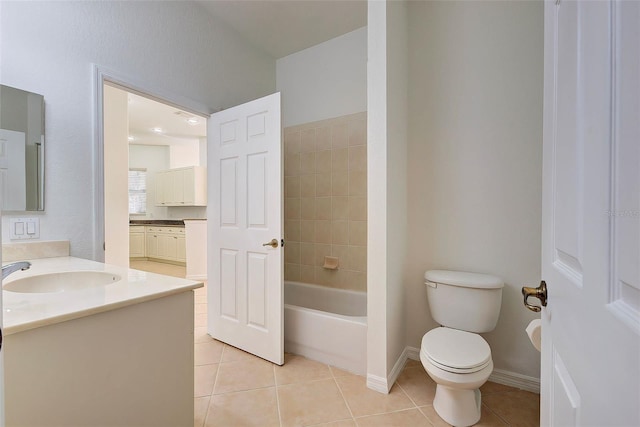 full bathroom with toilet, tile patterned flooring, tiled shower / bath, and vanity