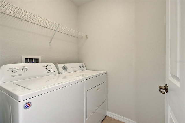 washroom with washer and clothes dryer