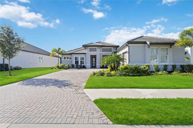 view of front facade with a front lawn