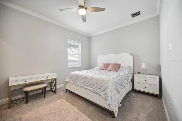 carpeted bedroom with crown molding and ceiling fan