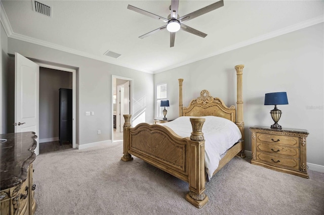 carpeted bedroom featuring crown molding, connected bathroom, and ceiling fan