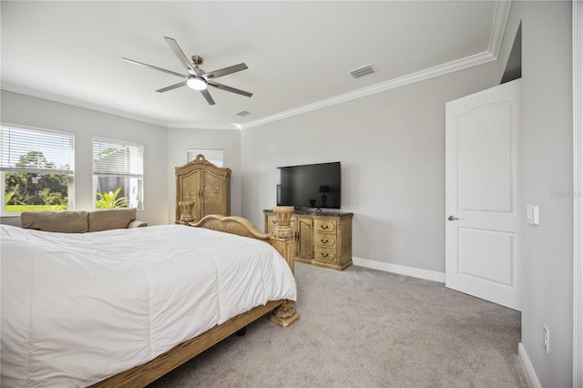 bedroom with light carpet, crown molding, and ceiling fan