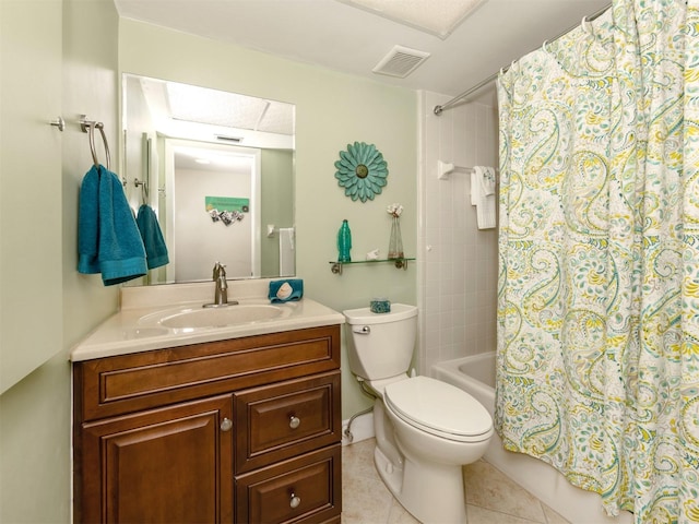 full bathroom featuring tile patterned floors, toilet, vanity, and shower / bath combo