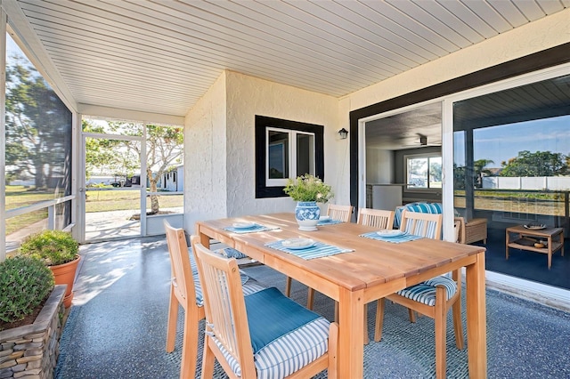 view of patio featuring outdoor dining area