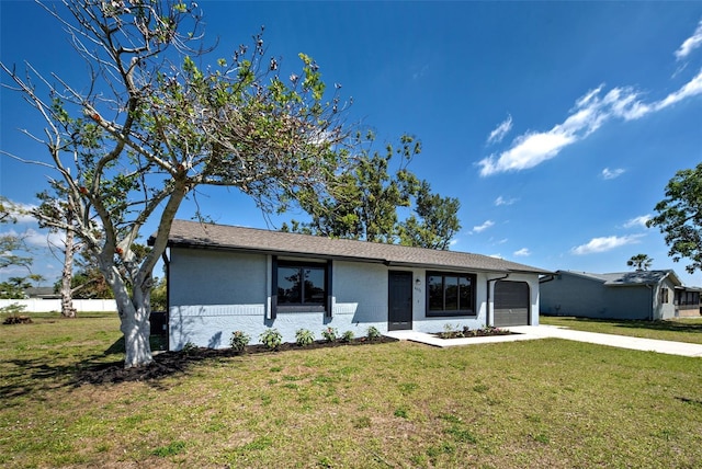 ranch-style home featuring a garage, driveway, a front lawn, and fence