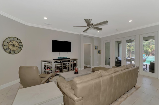 tiled living room with crown molding, ceiling fan, and french doors