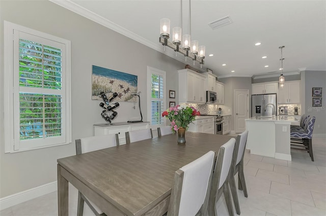 tiled dining area with ornamental molding