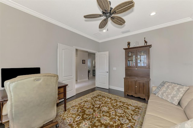 office area with ornamental molding and ceiling fan