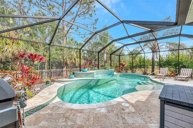 view of pool with a grill, a lanai, and a patio