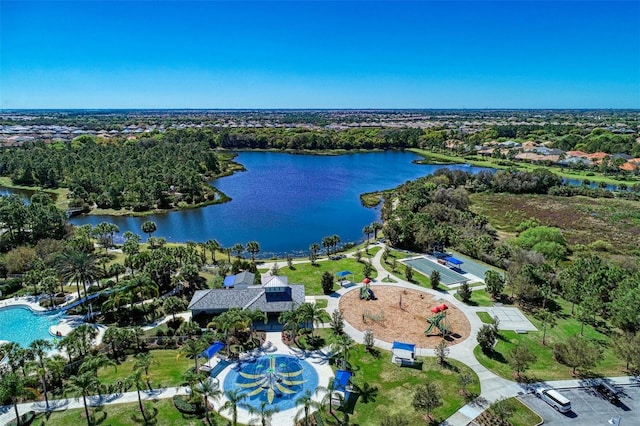 birds eye view of property with a water view