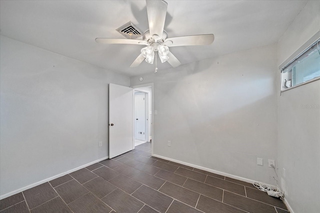 empty room featuring ceiling fan