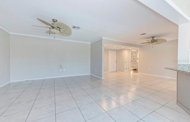 empty room featuring light tile patterned floors, crown molding, and ceiling fan