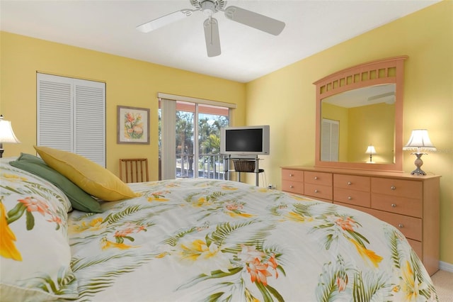 bedroom featuring carpet floors, access to outside, a closet, and ceiling fan