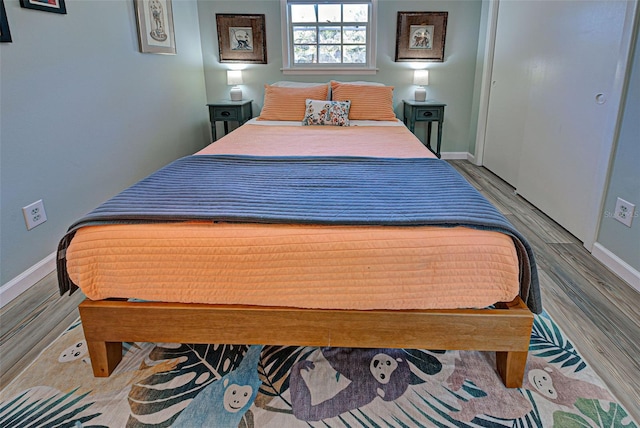 bedroom featuring light hardwood / wood-style floors