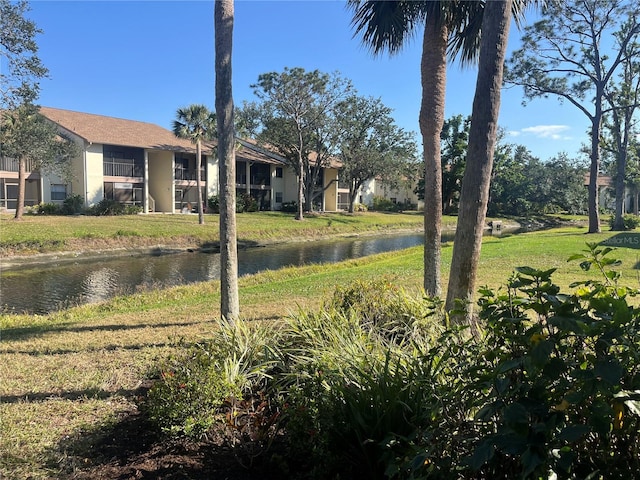 view of yard featuring a water view