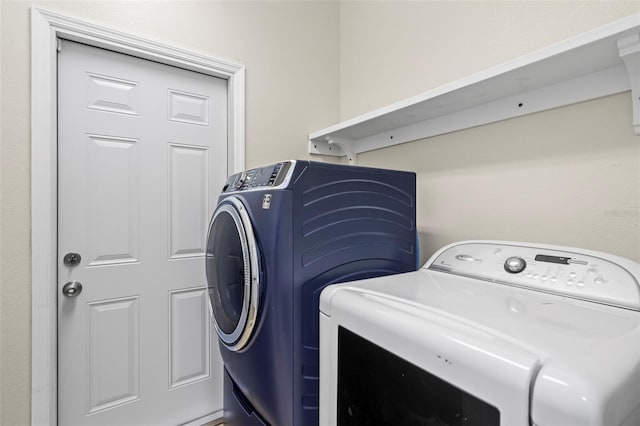 washroom featuring separate washer and dryer