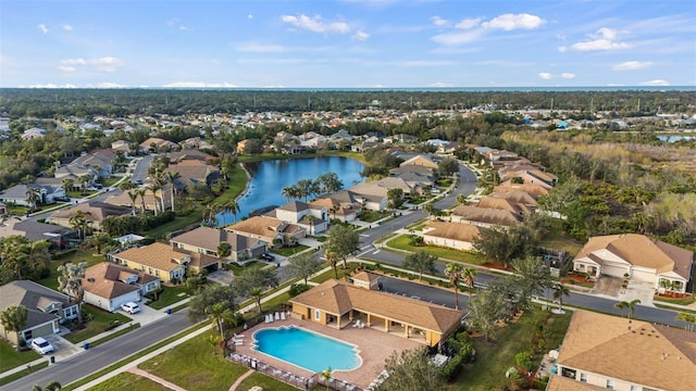 bird's eye view with a water view