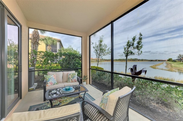 sunroom with a water view