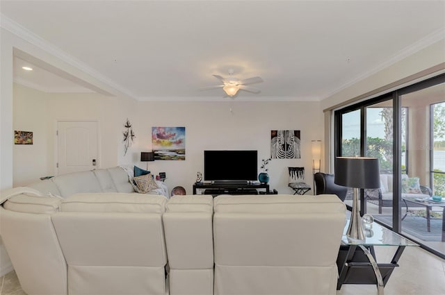 living room with crown molding and ceiling fan