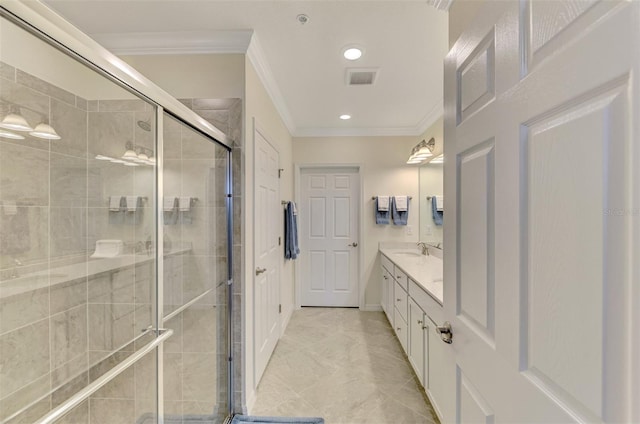 bathroom with vanity, an enclosed shower, and crown molding