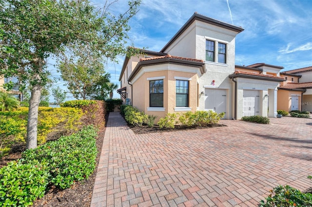 view of front of property with a garage