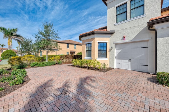 view of patio / terrace with a garage