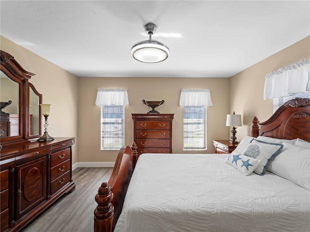 bedroom with light wood-type flooring