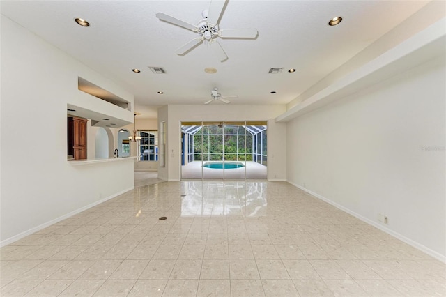 spare room featuring ceiling fan