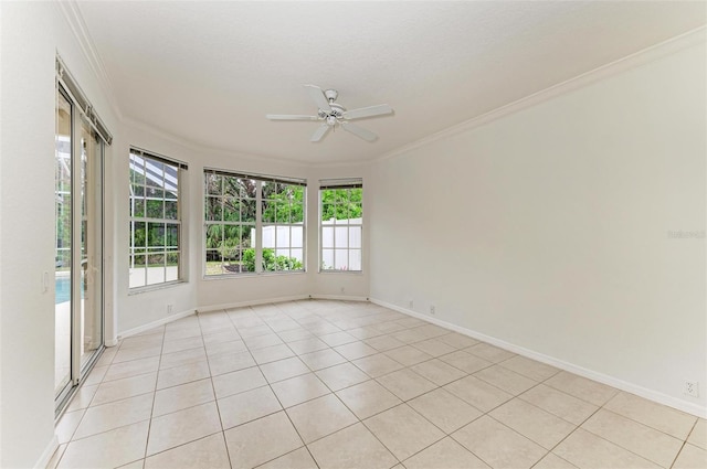 empty room with crown molding, ceiling fan, and light tile patterned flooring