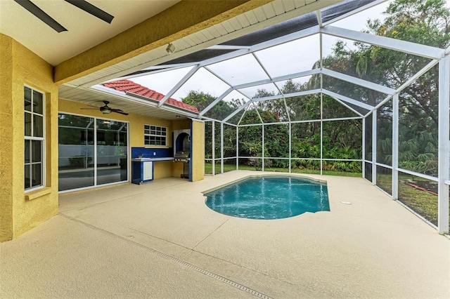 view of swimming pool featuring a lanai, area for grilling, ceiling fan, and a patio area