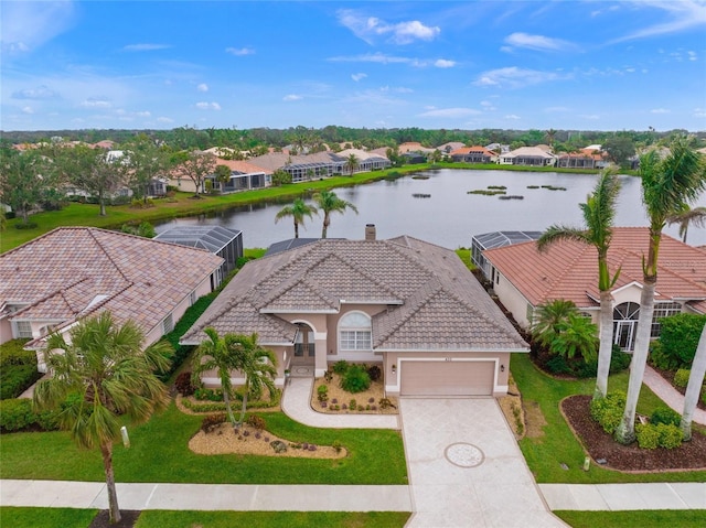 drone / aerial view featuring a water view