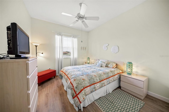 bedroom featuring hardwood / wood-style flooring and ceiling fan