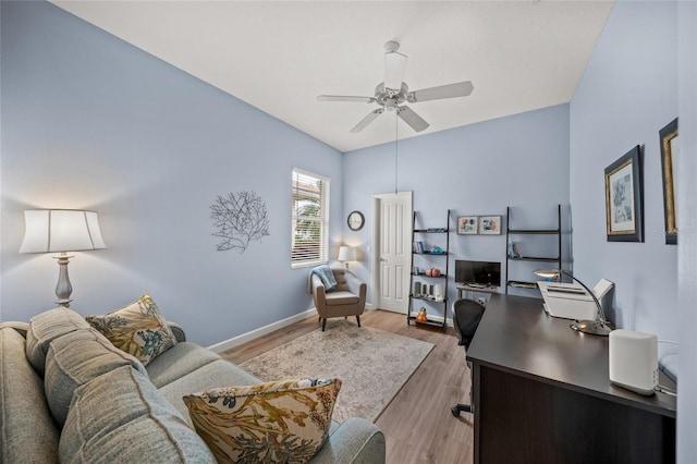 office space with hardwood / wood-style flooring and ceiling fan