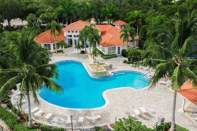 view of swimming pool with a patio area