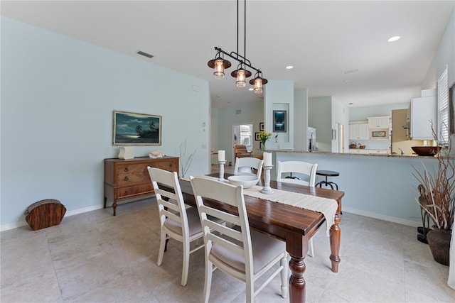 dining space with recessed lighting, visible vents, and baseboards