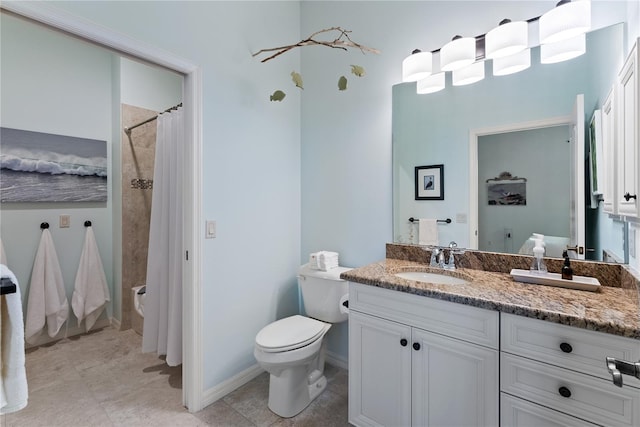 full bathroom featuring toilet, vanity, baseboards, a shower with curtain, and tile patterned floors