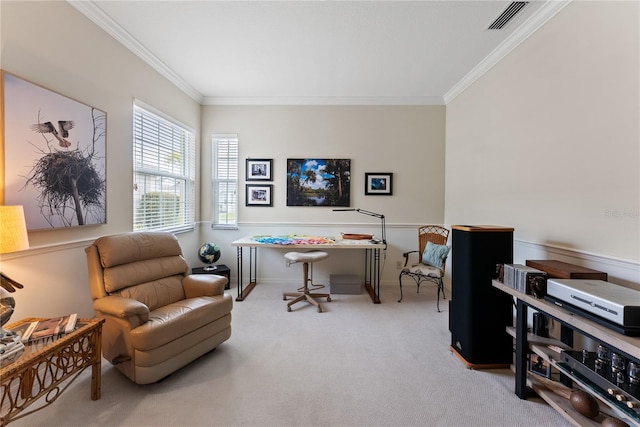 sitting room with carpet floors, visible vents, and crown molding